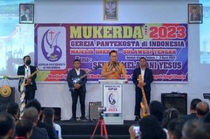 Bupati Delis Sampaikan Sambutan di MUKERDA GPDI Sulteng